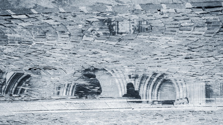 closeup of reflection in a puddle on the paved main square in Mulhouseの写真素材