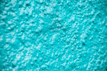closeup of blue plastered wall texture