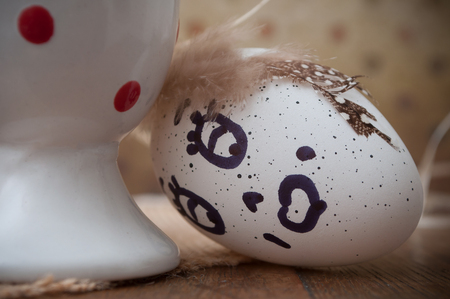 closeup of funny easter eggs with expressive face drawningの写真素材