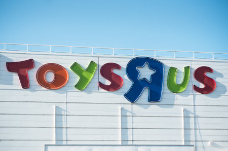 Mulhouse - France - 24 MArch 2018 - Toys r us logo on store on blue sky background . Toys r us is...