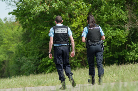 Mulhouse - France - 29 April 2018 - french gendarmerie patrol with bulletproof vests in border forestのeditorial素材