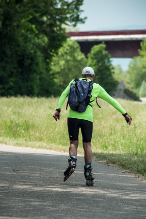 Mulhouse - France - 9 May 2018 - man  with roller blade in border channel