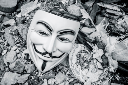 Paris - France - 19 May 2018 - Vendetta mask on the floor of abandoned factory . This mask is a...