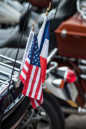 Gerarmer - France -26 May 2018 - retail of  american flag on Harley Davidson motorbike parked in the...