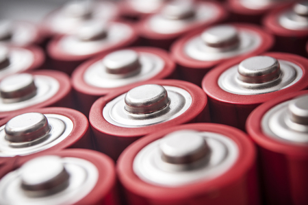 closeup of red and silver aa alkaline batteries groupの写真素材