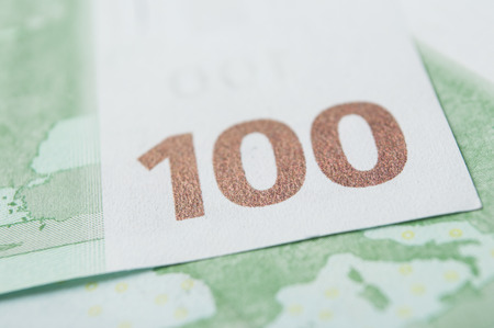 Closeup of banknotes of hundred euros moneyの写真素材