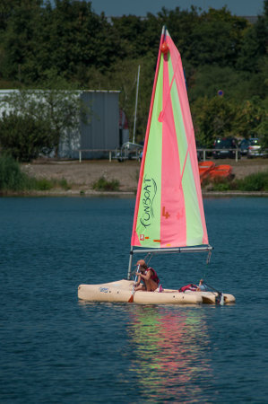 Reinningue - France - 18 July 2018 - catamaran sailing on the lake of reiningueのeditorial素材