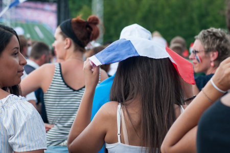 Mulhouse - France - 15 July 2018 - french supporter of football with french flags during the giant screen projection of the final of the world cup :  france - croatiaのeditorial素材