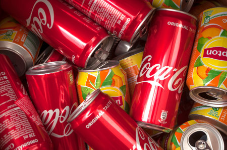Mulhouse - France - 10 September 2018 - closeup of coca cola and lipton ice tea can for recycling