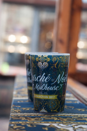 Mulhouse - France - 8 December 2018 -  closeup of two mulled wine in traditional cup on bar at the christmas marketのeditorial素材