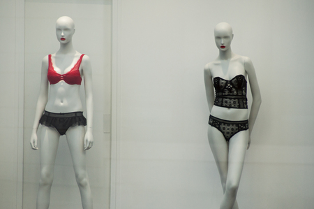 closeup of red and black underwear on mannequin in fashion store showroom for womenの写真素材