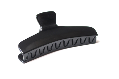 closeup of black plastic clip for women long hairの写真素材