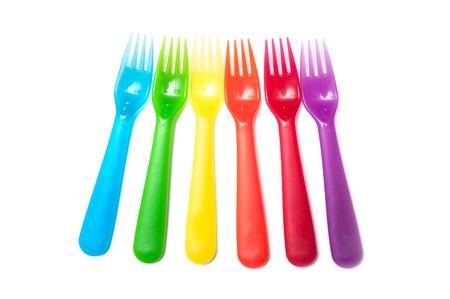 set of colorful baby plastic forks on white backgroundの写真素材