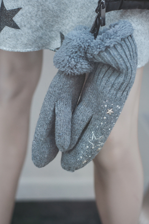 closeup of grey wool gloves on mannequin in fashion store showroom for womenの写真素材
