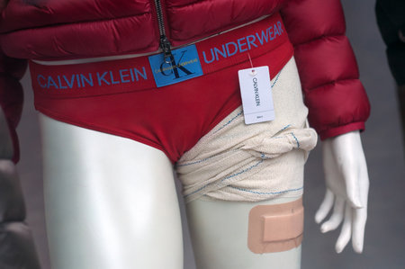 Mulhouse - France - 13 January 2019 - Closeup of Calvin Klein red bikini on mannequin wearing red...