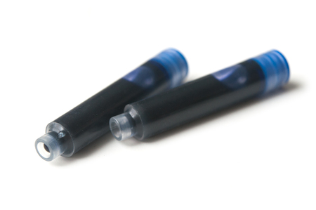 group of plastic cartridge of ink on white backgroundの写真素材