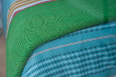 closeup of colorful set of bed linen in store showroom