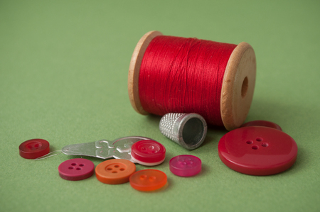 closeup of sewing set on green backgroundの写真素材