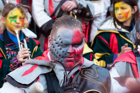 Mulhouse - France - 9 March 2019 - portrait of musician with beautiful makeup in band parading in the streetのeditorial素材
