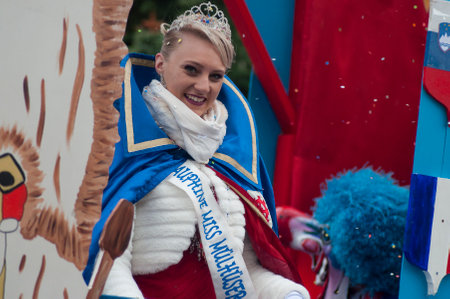 Pfastatt - France - 17 March 2019 - portrait of miss carnaval smiling during the parade in the streetのeditorial素材