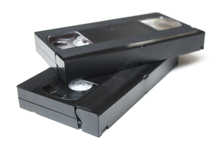 Closeup of vintage VHS Cassettes on white backgroundの写真素材