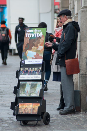 Mulhouse - France - 12 April 2019 - Jehovah witnesses standing in the streetのeditorial素材