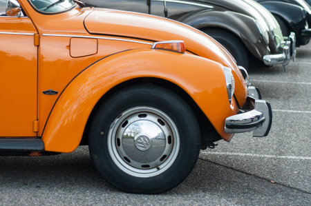 Mulhouse - France - 12 May 2019 -  closeup of orange old Volkswagen beetle parked in the streetのeditorial素材