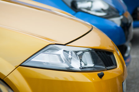 Mulhouse - France - 12 May 2019 - closeup of yellow Renault Megane rs sport front parked in the...