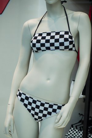 closeup of black and white  bikini on mannequin in fashion store showroom for womenの写真素材