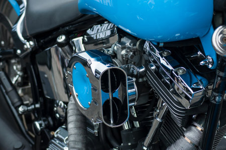 Illzach - France -9 June 2019 - closeup of chromes on blue Harley Davidson motorbike at fun car show eventのeditorial素材