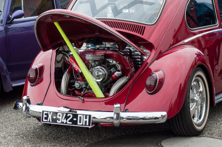 Illzach - France - 9 June 2019 - closeup of red Volkswagen cox motor at fun car show eventのeditorial素材