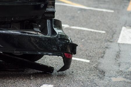 Closeup of crashed car parked in the streetの写真素材