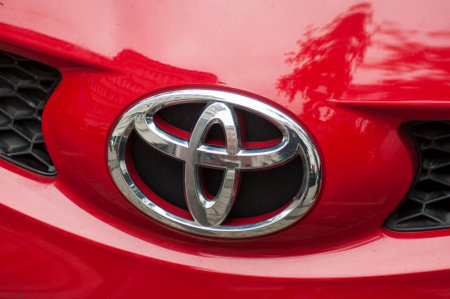 Mulhouse - France - 19 August 2019 - Closeup of logo on red Toyota car front parked in the streetのeditorial素材