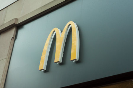 Mulhouse - France - 25 August 2019 - Closeup of Mc Donald's logo on fast food entry in the street
