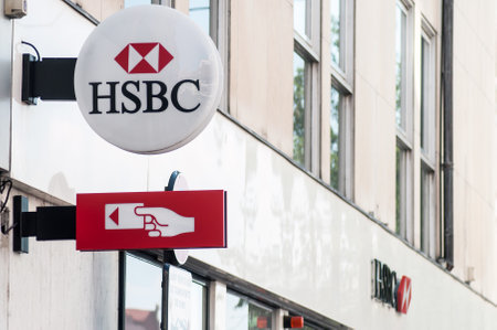 Colmar - France - 24 August 2019 - Closeup of HSBC sign on Bank agency building in the streetのeditorial素材