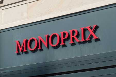 Colmar - France - 24 August 2019 - Closeup of Monoprix sign on supermarket facade in the streetのeditorial素材