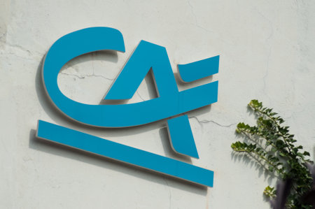 Mulhouse - France - 6 September 2019 - Closeup of Credit Agricole logo on bank agency facade