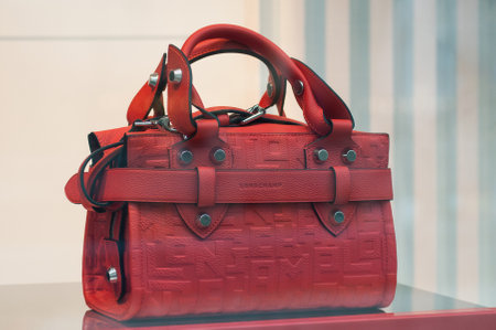 Mulhouse - France - 8 September 2019 - Closeup of red leather bag inLongchmp Store the french  luxury fashion storeのeditorial素材