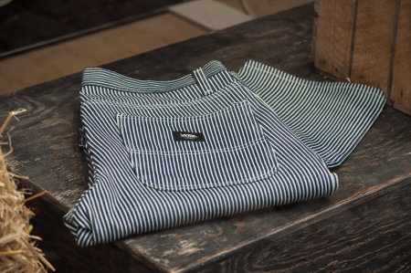 Mulhouse - France - 8 September 2019 - Closeup of black stripped trousers from van's brand in fashion store showroomのeditorial素材