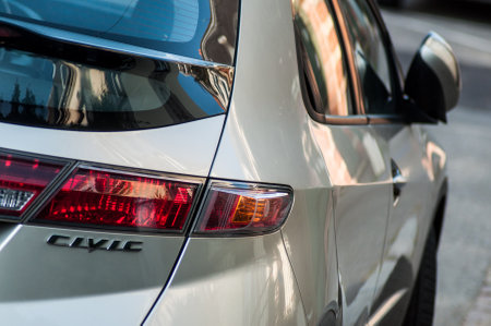 Mulhouse - France - 11 September 2019 - Closeup of rear light and sign on Honda civic parked in the...