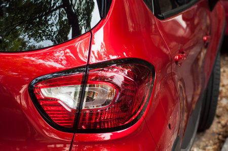 Mulhouse - France - 8 September 2019 - Closeup of rear light on red Renault captur parked in the streetのeditorial素材
