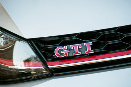 Photo pour Mulhouse - France - 17 September 2019 - Closeup of GTI sign on grey Volkswagen Golf GTI front parked in the street - image libre de droit