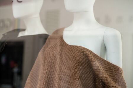 closeup of woolen pullover on mannequin in fashion store showroom for womenの写真素材