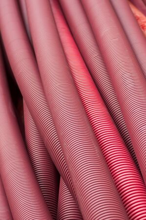 Closeup of plastic tubes in construction site