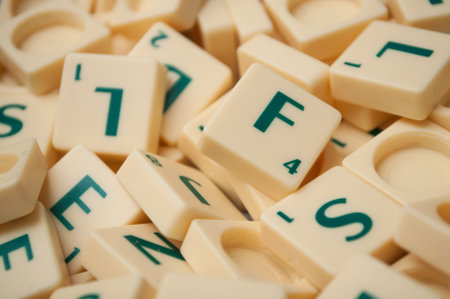 Mulhouse - France - 1 October 2019 - Closeup of plastic letters of Scrabble gameのeditorial素材