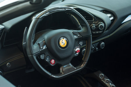 Mulhouse - France - 5 October 2019 - Closeup of dashboard in Ferrari 488 spider in retailer showroom