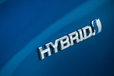 Mulhouse - France - 9 October 2019 - Closeup of Hybrid sign on blue toyota carのeditorial素材
