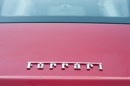 Mulhouse - France - 13 October 2019 - Closeup of Ferrari logo on red sport car rear view parked in...