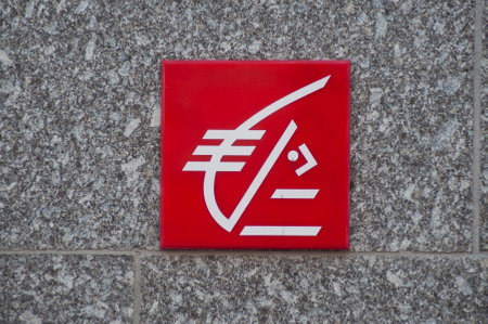Mulhouse - France - 24 October 2019 - Closeup of Caisse d epargne logo on stoned wall of th french bank agencyのeditorial素材
