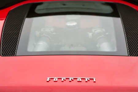 Mulhouse - France - 10 November 2019 - Rear view of Ferrari logo and V8 engine on red Ferrari 360...